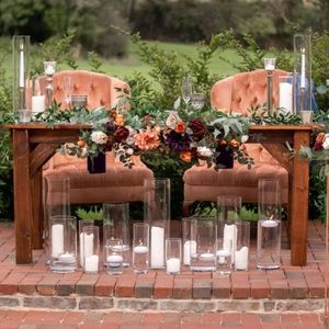 Lings moment sweetheart table swags. Artificial flowers. Arrangments.